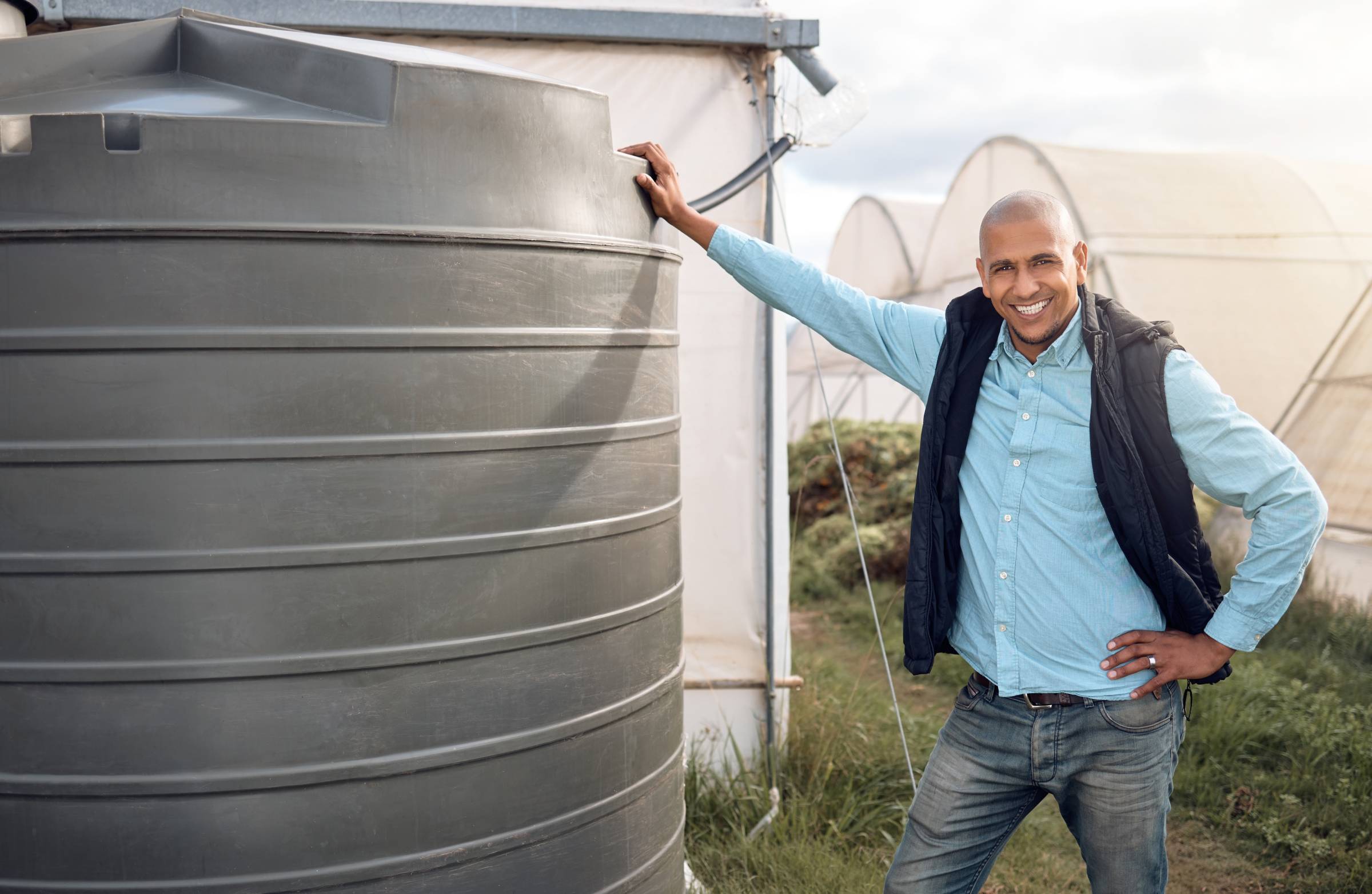 farmer portrait and water tank in farming liquid 2023 11 27 04 55 31 utc 1